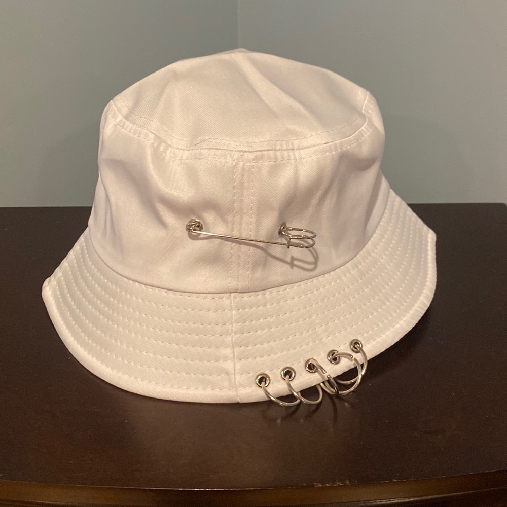 White bucket hat with pins